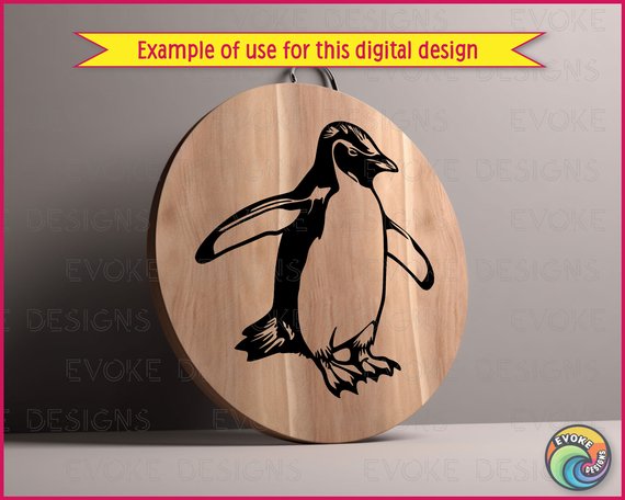 Black silhouette image of a penguin design in a clean vector style. The penguin is shown standing upright with its flippers slightly extended outward, capturing a natural and lifelike pose. The body has a smooth, rounded shape with clear contrast between the dark back and flippers and the lighter belly. Fine detailing in the feathers around the head, wings, and feet adds texture while keeping the overall silhouette simple and striking. The beak is pointed forward, giving the penguin a confident stance, while the webbed feet are clearly defined at the base. The high-contrast black and white layout highlights the classic penguin markings, making the design visually bold and eye-catching.