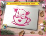 A black outline silhouette image of a cartoon baby teacup pig sitting inside a teacup that features a solid heart on the front. The teacup pig has large ears, detailed eyelashes, and its small hooves rest on the rim of the cup, which sits on a matching saucer. This minimalist digital vector clipart is a clean cut file design on a transparent background, available as an SVG or PNG.